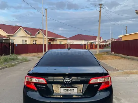 Toyota Camry 2012 года за 4 500 000 тг. в Атырау – фото 2