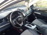 Toyota Camry 2013 года за 8 700 000 тг. в Актобе – фото 2