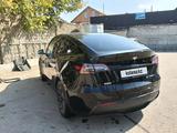 Tesla Model Y 2024 года за 14 800 000 тг. в Алматы – фото 2