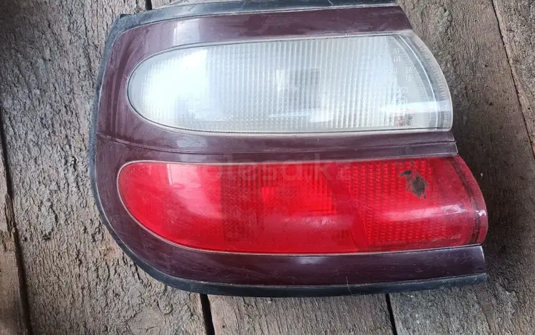 Nissan альмера задний фонарь за 1 101 тг. в Алматы
