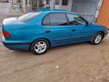 Toyota Carina E 1996 года за 1 500 000 тг. в Туркестан – фото 2