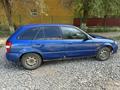 Mazda 323 2001 годаүшін500 000 тг. в Актобе – фото 4