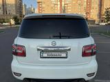 Nissan Patrol 2011 года за 12 500 000 тг. в Астана – фото 4