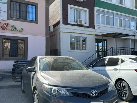 Toyota Camry 2014 года за 9 500 000 тг. в Атырау