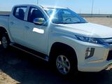 Mitsubishi L200 2022 годаүшін12 500 000 тг. в Атырау – фото 2