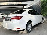 Toyota Corolla 2013 года за 6 190 000 тг. в Шымкент – фото 4