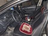 Kia Cerato 2012 года за 3 800 000 тг. в Астана – фото 4