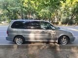 Kia Carnival 2005 годаүшін1 500 000 тг. в Алматы – фото 3