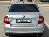 Skoda Rapid 2014 года за 2 895 000 тг. в Актау – фото 2