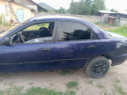 Mazda 323 1994 года за 550 000 тг. в Алматы – фото 5