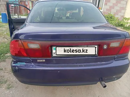 Mazda 323 1994 года за 550 000 тг. в Алматы – фото 2