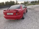 Mitsubishi Carisma 1998 года за 1 400 000 тг. в Костанай – фото 2