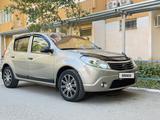 Renault Sandero 2011 года за 3 600 000 тг. в Аксай – фото 5