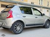 Renault Sandero 2011 года за 3 600 000 тг. в Аксай – фото 4