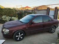 Mazda 323 1998 года за 900 000 тг. в Алматы