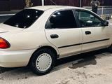 Mazda 323 1995 года за 1 600 000 тг. в Турара Рыскулова – фото 3
