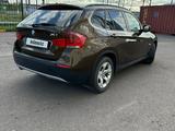 BMW X1 2011 года за 6 500 000 тг. в Астана – фото 2