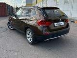 BMW X1 2011 года за 6 500 000 тг. в Астана – фото 5