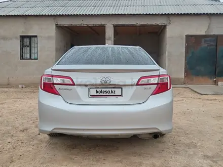 Toyota Camry 2014 года за 6 300 000 тг. в Жанаозен – фото 8