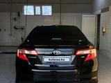 Toyota Camry 2012 года за 8 250 000 тг. в Жанаозен – фото 4