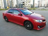 Toyota Camry 2014 года за 7 650 000 тг. в Астана