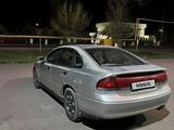 Mazda Cronos 1992 года за 600 000 тг. в Алматы – фото 3