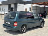 Kia Carnival 2001 года за 3 300 000 тг. в Жанаозен – фото 4