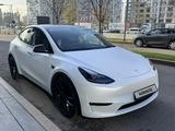 Tesla Model Y 2023 года за 21 500 000 тг. в Алматы