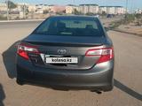 Toyota Camry 2014 года за 7 900 000 тг. в Актобе