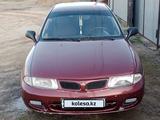 Mitsubishi Carisma 1997 годаүшін1 800 000 тг. в Актобе