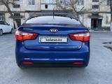 Kia Rio 2013 года за 4 100 000 тг. в Шымкент – фото 3