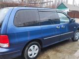 Kia Carnival 2001 года за 4 100 000 тг. в Шымкент – фото 2