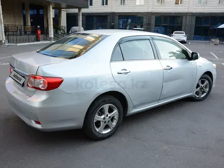 Toyota Corolla 2013 года за 5 300 000 тг. в Алматы – фото 33