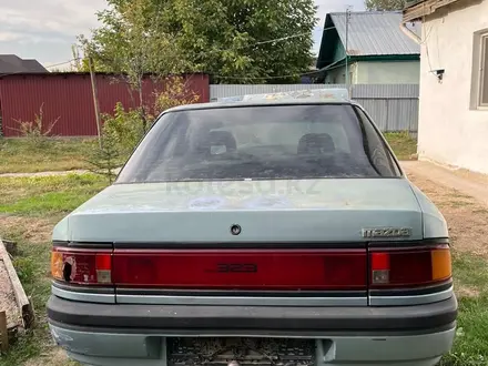 Mazda 323 1993 года за 400 000 тг. в Алматы – фото 4