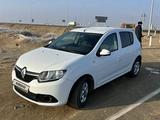 Renault Sandero 2014 года за 3 000 000 тг. в Атырау – фото 2
