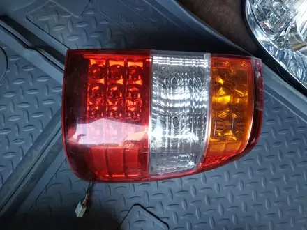 Задний фонарь на крышку багажника Toyota Land Cruiser 100үшін100 тг. в Алматы