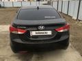 Hyundai Elantra 2013 года за 3 000 000 тг. в Атырау – фото 2