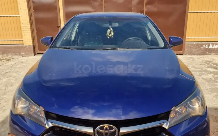Toyota Camry 2015 года за 6 700 000 тг. в Атырау