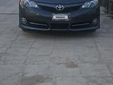 Toyota Camry 2014 года за 6 900 000 тг. в Жанаозен