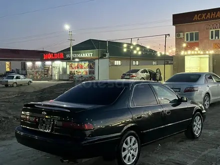 Toyota Camry 1998 года за 2 000 000 тг. в Жанаозен – фото 10