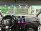 Renault Logan 2014 года за 1 700 000 тг. в Алматы – фото 5