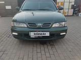 Nissan Primera 1998 года за 1 950 000 тг. в Астана – фото 2