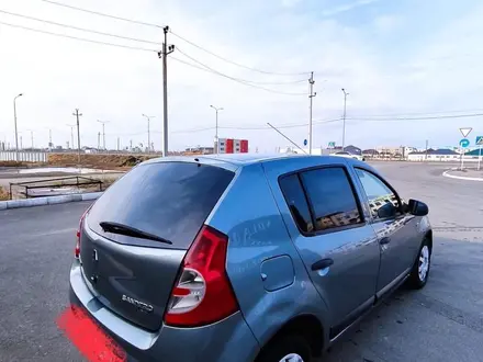 Renault Sandero 2011 года за 3 000 000 тг. в Атырау – фото 2