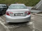 Toyota Camry 2013 года за 4 300 000 тг. в Актобе – фото 2