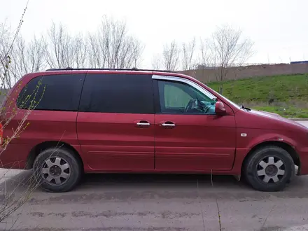 Kia Carnival 2003 года за 3 200 000 тг. в Алматы – фото 10