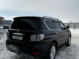 Nissan Patrol 2012 года за 14 200 000 тг. в Астана – фото 5