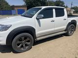 Toyota Hilux 2011 года за 8 500 000 тг. в Ганюшкино – фото 2