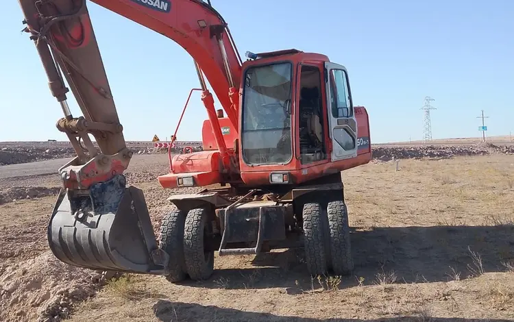 Doosan  DX140W 2010 года за 18 500 000 тг. в Алматы