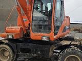 Doosan  DX140W 2010 годаfor17 700 000 тг. в Алматы – фото 2