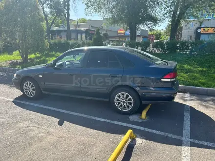 Mazda 626 1998 года за 2 599 000 тг. в Алматы – фото 5